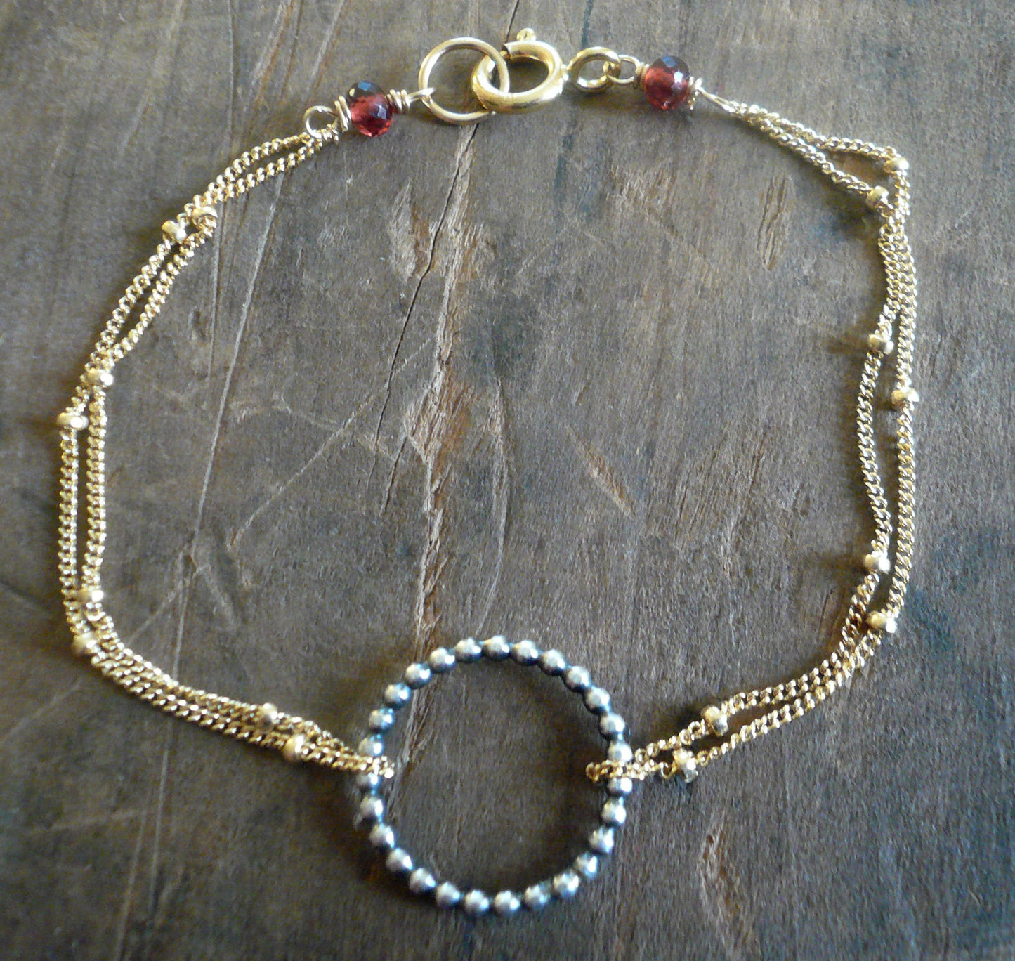 Rouge Collection Bracelet- Oxidized sterling silver. 14kt Goldfill. Mixed Metals. Garnet. Handmade